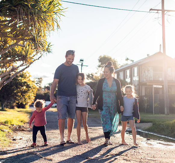 Family walking in a suburb
